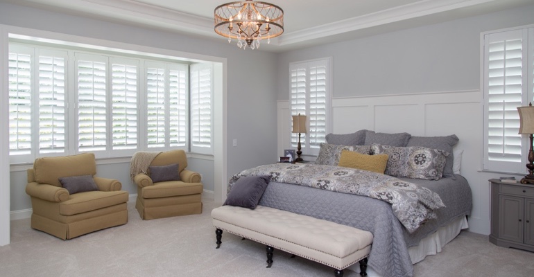 White shutters in Charlotte bedroom.